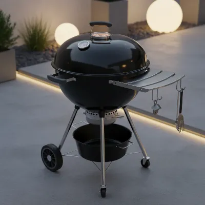 Black Napoleon PRO charcoal kettle grill with side shelf and thermometer.